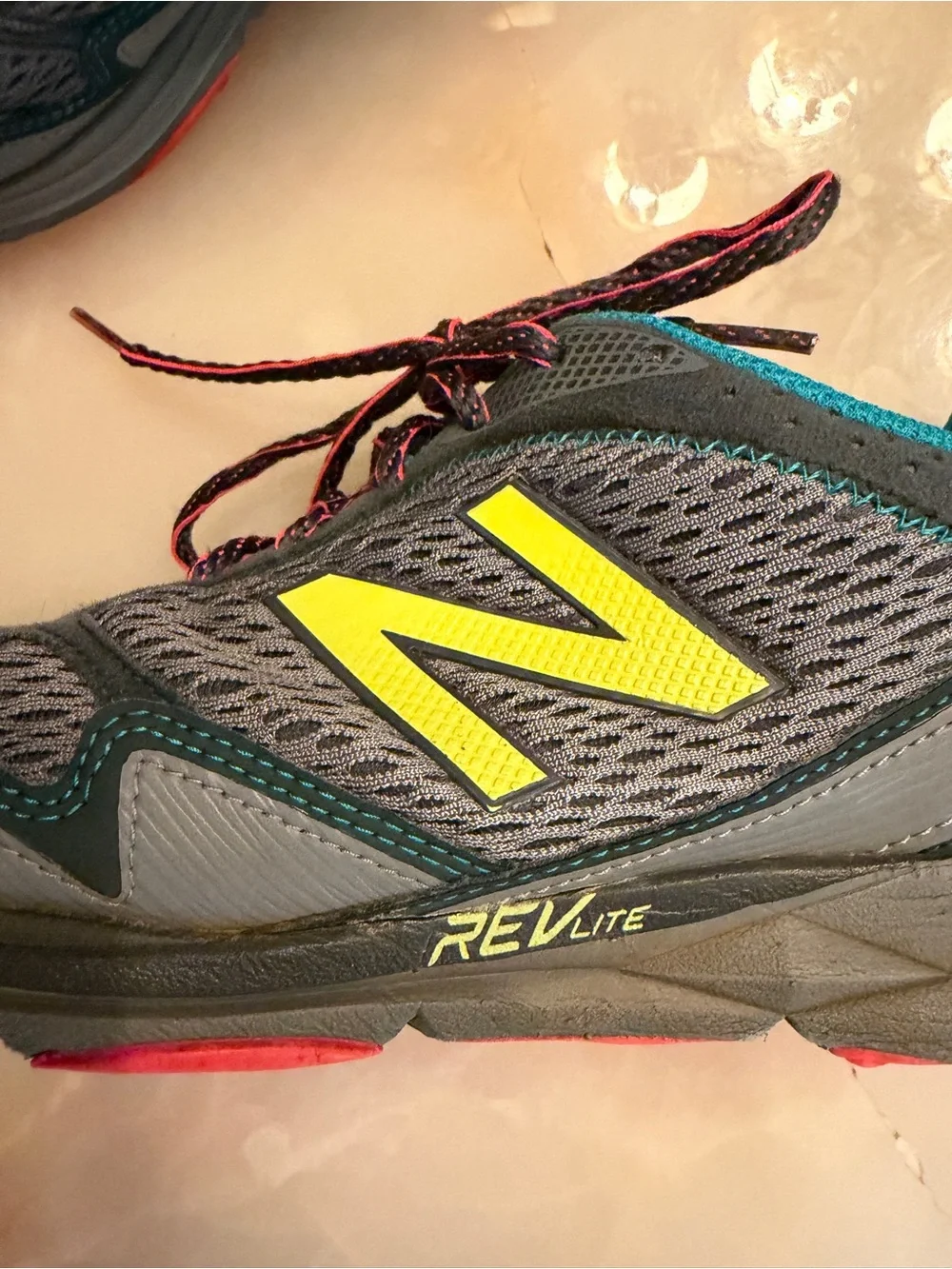New Balance Kids Gray Sneakers with Teal and Neon Yellow Accents